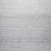 The Tufted Teal Jules Rug 300x240cm features a subtle geometric pattern of curved and straight lines, arranged symmetrically in a Mid-Century inspired design. The textured surface adds visual interest to any space.