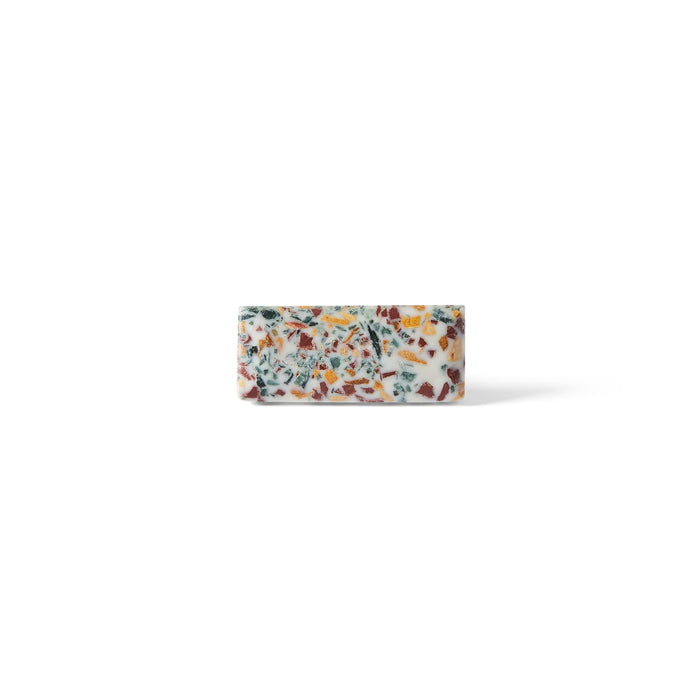 The Speckle Terazzo Knob Small 5.4cm features colorful chips embedded in a white base, creating a terrazzo look reminiscent of stylish cabinet hardware, shown here against a plain white background.
