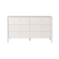 The Spintara 6 Drawer Low Chest White features a minimalist design with rounded edges, crafted from pine timber. It is shown against a plain white background.